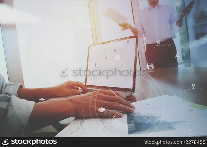 co working team meeting concept,businessman using smart phone and digital tablet and laptop computer in modern office with virtual icon diagram