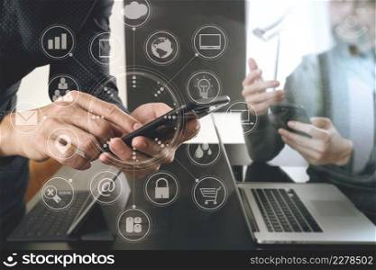 co working team meeting concept,businessman using smart phone and digital tablet and laptop computer in modern office with virtual graph chart diagram