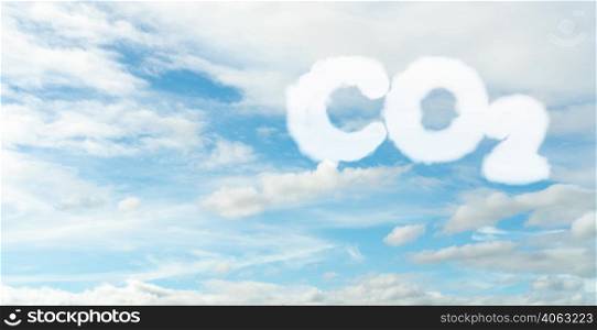 CO2 symbol on blue sky and white clouds. CO2 emissions. Greenhouse gas. Carbon dioxide gas global air climate pollution. Environment issue. Background for carbon capture and storage technology.