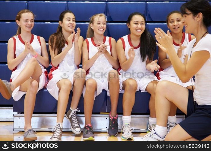 Coach Of Female High School Basketball Team Gives Team Talk
