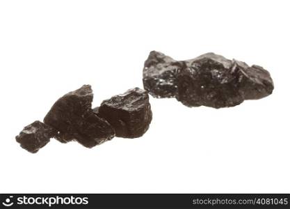Coal lumps carbon nugget isolated on white. Power and energy source.