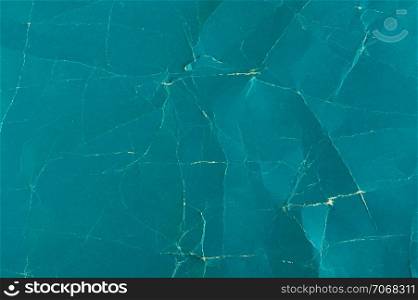 Coarse cyan paper texture. Abstract grunge background. Distressed and industrial backdrop design. Rough detail grain pattern.. Rough cyan paper texture. Abstract grunge background. Coarse detail grain pattern.