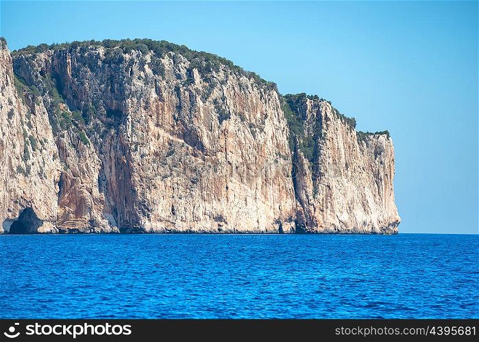 Coast and blue Mediterranean sea in Sardinia, Italy. View from the ya?ht