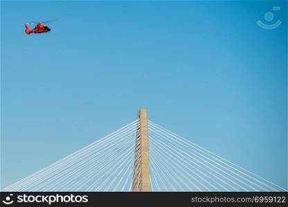coast guard flying over cooper river bridge in charleston sc