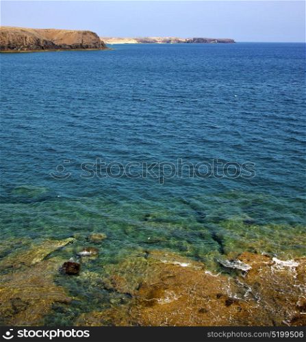 coast lanzarote in spain musk pond beach water yacht boat and summer