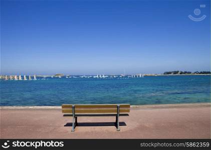 Coast of France in Brittany, bench in Port-Blanc