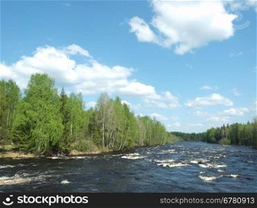 Coast of the river in the spring. Karelia, Russia