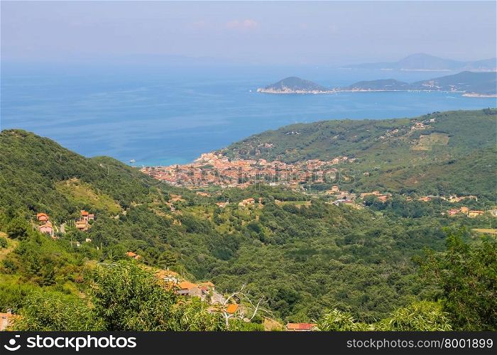 Coast of Tyrrhenian Sea on Elba Island, Italy. Panorama of Marciana Marina. View from Marciana.
