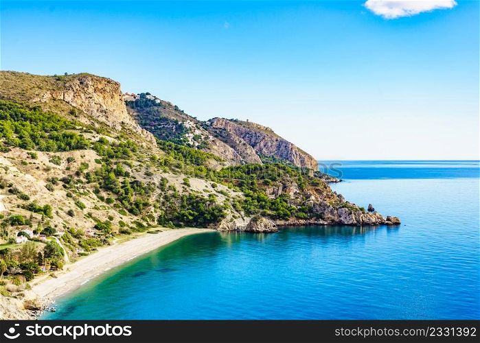 Coast seaside landscape in Andalusia. Cliffs of Maro Cerro Gordo Natural Park, near Nerja, Malaga province, Costa Del Sol, Spain.. Coast landscape, cliffs in Andalusia Spain