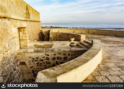 Coastal fortification, castle near the town of Los Banos de Guardias Viejas, Almeria province, Andalusia Spain. Tourist attraction. Guardias Viejas castle, Almeria Spain