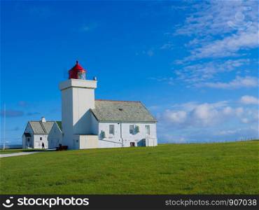 Coastal landscape. Obrestad lighthouse in south Norway, Norwegian national tourist county route road 44 Jaeren.. Obrestad lighthouse in Norway.