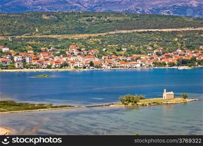 Coastal town of Posedarje and small island church, Dalmatia, Croatia