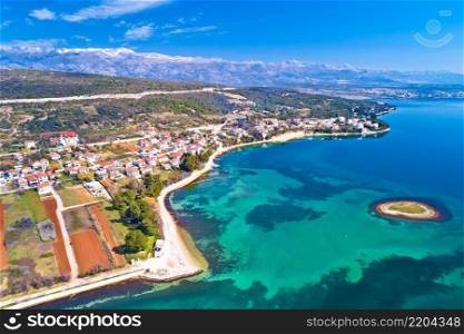 Coastal town of Posedarje and Velebit mountain aerial view, Dalmatia region of Croatia 