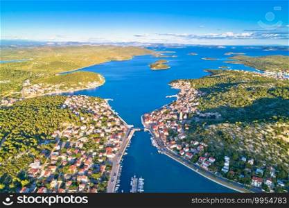 Coastal town of Tisno aerial panoramic view, bridge to island of Murter, Dalmatia, Croatia