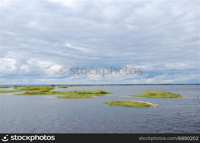 Coastal wetland with small green islands by the coast of the swedish island Oland in the Baltic Sea
