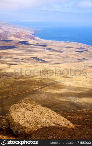 coastline lanzarote view from the top in spain africa and house field