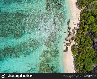 Coastline of La Digue Island, Seychelles aerial overhead view.. Coastline of La Digue Island, Seychelles aerial overhead view