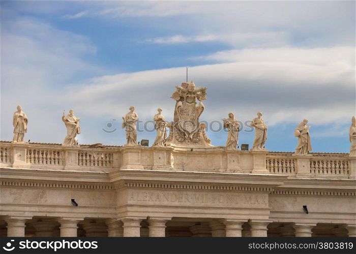 Coat of arms and statues in the Vatican. Rome, Italy