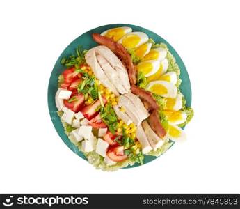 Cobb Salad - Colorful hearty entree sized salad with bacon, chicken, boiled eggs, corn, - a main-dish American garden salad ,isolated