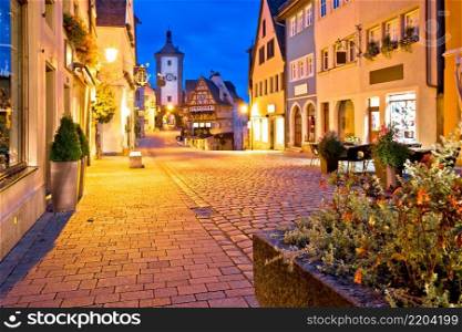 Cobbled street of historic town of Rothenburg ob der Tauber evening view, Romantic road of Bavaria region of Germany