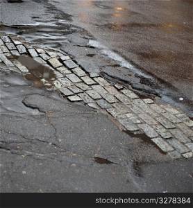 Cobblestone and pavement in Manhattan, New York City, U.S.A.