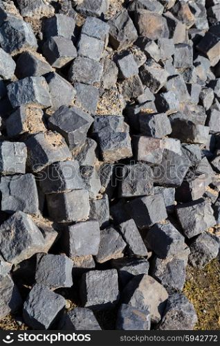 Cobblestone stored at a construction site. Cobblestone stored at a construction site.