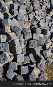 Cobblestone stored at a construction site. Cobblestone stored at a construction site.