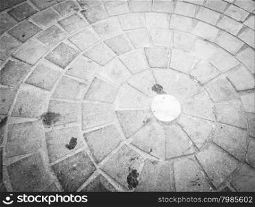 cobblestones in circle. Image of urban pavement dirty