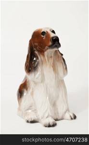 Cocker Spaniel. Ceramic figurine, dog breed isolated on white