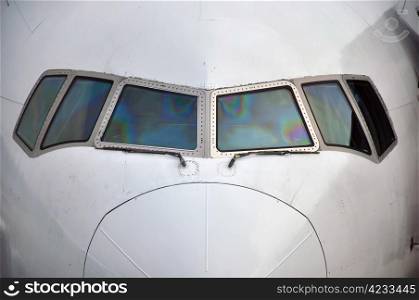 cockpit of commercial airliner waiting at airport