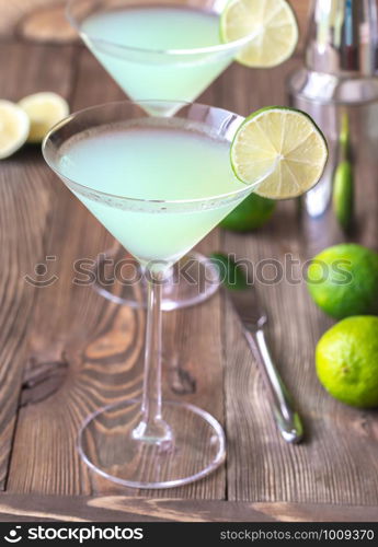 Cocktail glass of classic daiquiri on the wooden background