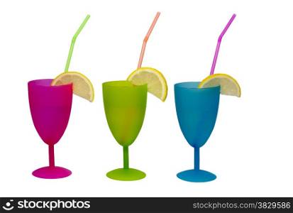 cocktail glasses with straw and lemons isolated on white