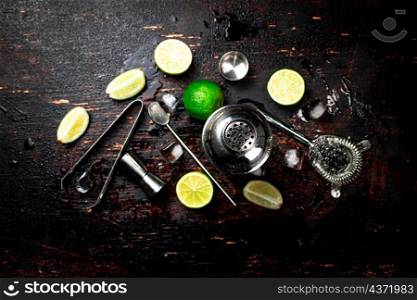 Cocktail ingredients. Against a dark background. High quality photo. Cocktail ingredients. Against a dark background.