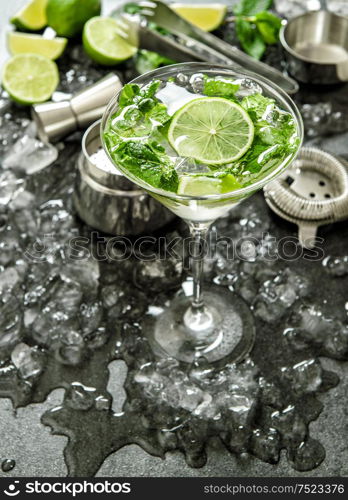 Cocktail ingredients lime, mint leaves, ice. Aperitif. Food and beverages