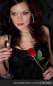 Cocktail party woman drink champagne hold red rose