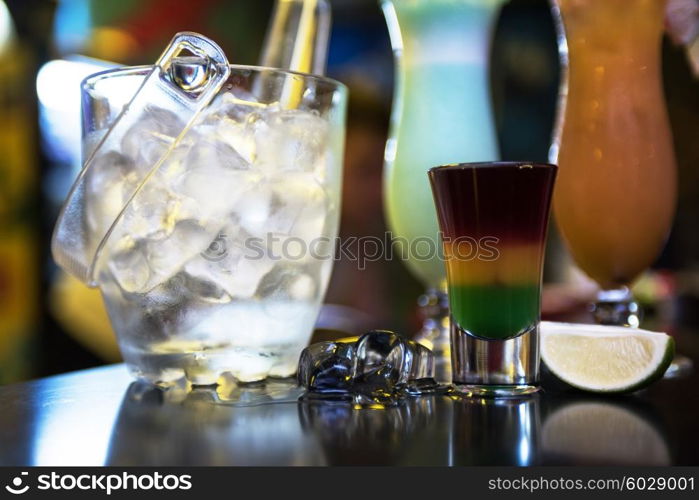 cocktails on bar background. Glasses of different cocktails on bar background