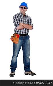 Cocky laborer posing on white background