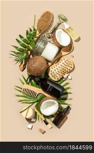 Coconut oil and natural cosmetic products, hair, face and body treatment, massage and spa concept, flat lay, top view