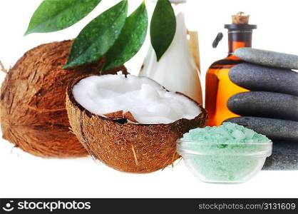 Coconut,salt,stones and massage oil for body close up