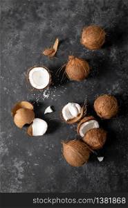 Coconuts cracked and whole nuts