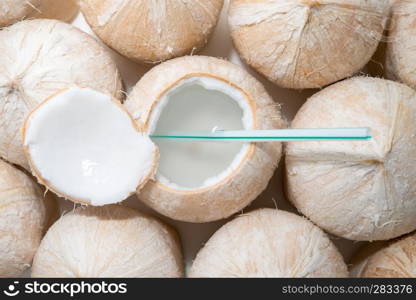 coconuts water with coconuts background