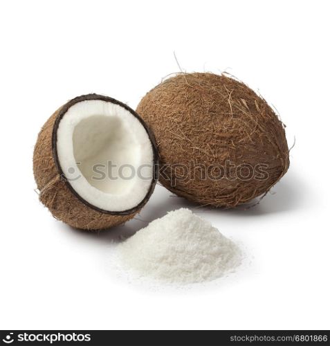Coconuts with white shredded coconut meat on white background