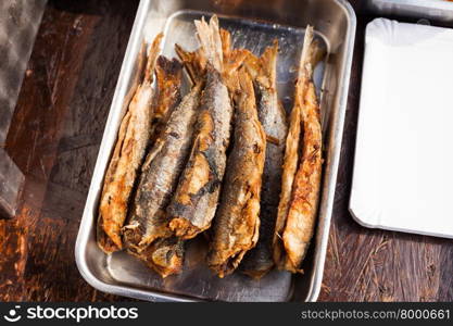 Cod filets in a stainless steel dish, ready to eat