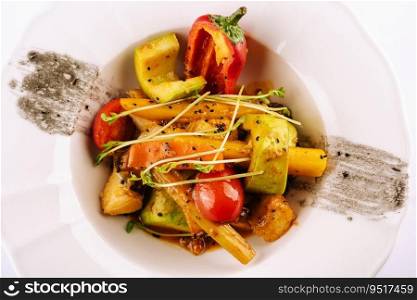 Cod fish baked with vegetables top view