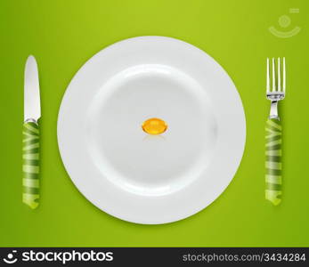 Cod Liver oil on white plate with knife and fork on blue background.