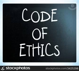 ""Code of ethics" handwritten with white chalk on a blackboard"