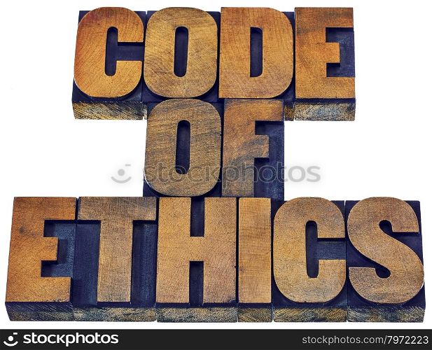code of ethics word abstract - isolated text in letterpress wood type printing blocks stained by inks