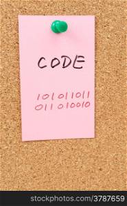 Code word and symbol drawn on paper and pinned on cork board