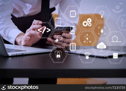 Coding software developer work with augmented reality dashboard computer icons of scrum agile development and code fork and versioning with responsive cybersecurity.businessman working with smart phone.