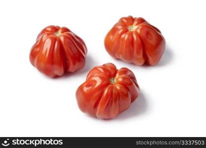Coeur de boeuff tomatoes on white background